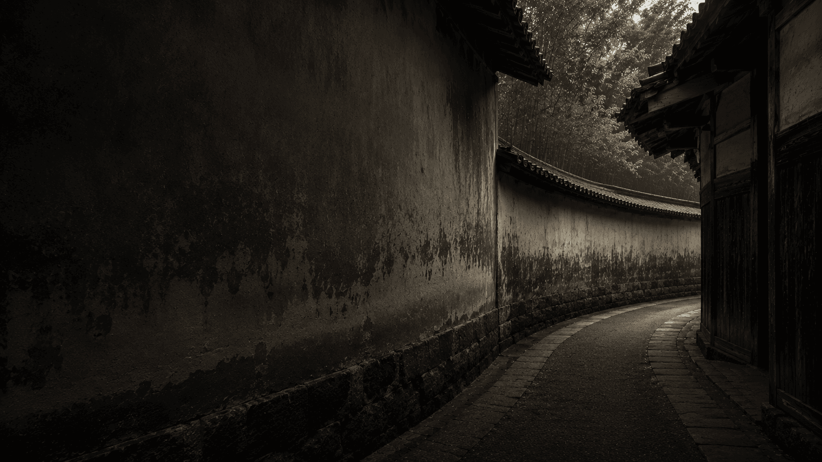 A narrow path between old earthen walls